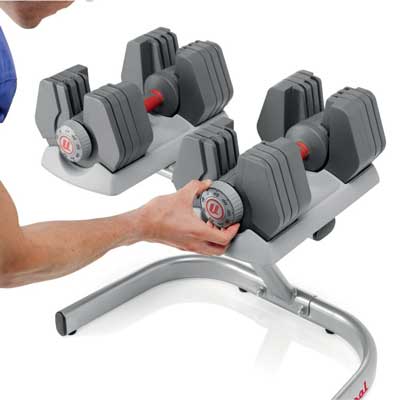 3. Universal PowerPak Adjustable Dumbbells with Stand - 4-45 lbs